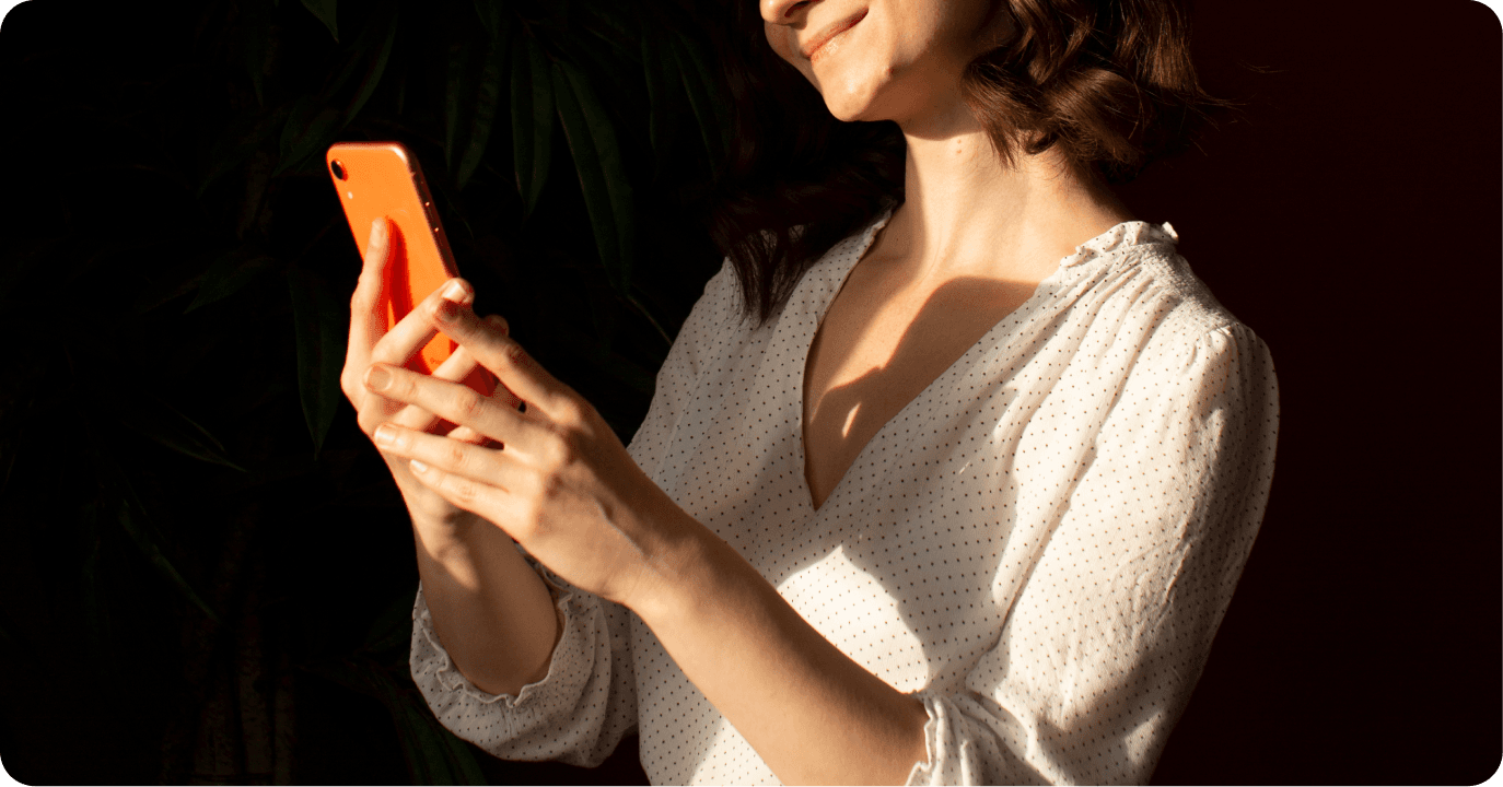 A merchant completing a digital payment on a smartphone